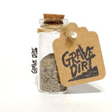 A Vial of dirt taken from the grave of a well known serial killer...